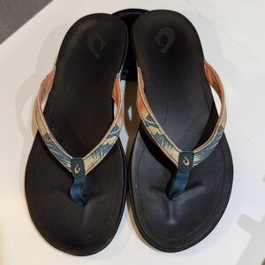 Olukai Ho'opio Womens Flip Flop Black, Orange/Teal Floral Strap Thong Sandals